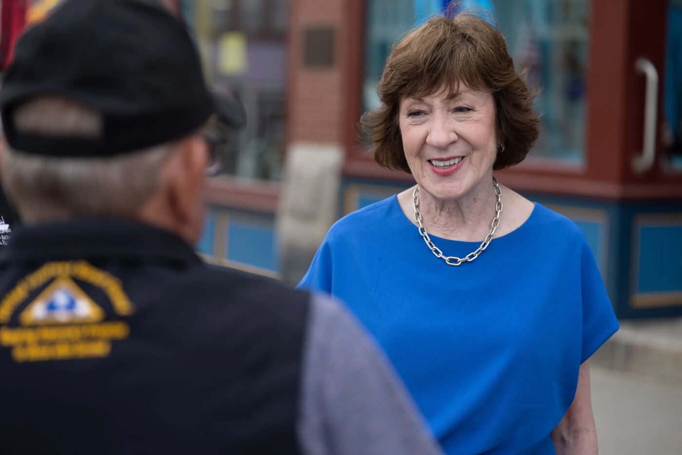 Senator Collins talking with a Maine veteran